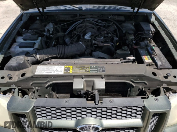 2003 Ford Explorer Sport XLS z VIN 1FMYU60E53UA78241, wystawiony jako Copart lot #54566005 z przebiegiem 187 731 mil mil oraz Szkody całkowita. Historia ofert i sprzedaży dostępna na DreamBid. Obrazek 12.