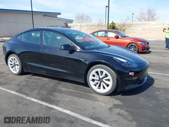 2022 Tesla Model 3 Long Range with VIN 5YJ3E1EB1NF133356, listed as a IAAI auction lot 41568303 with 73,406 mi miles and . Bid and sale history available at DreamBid. Image 12.
