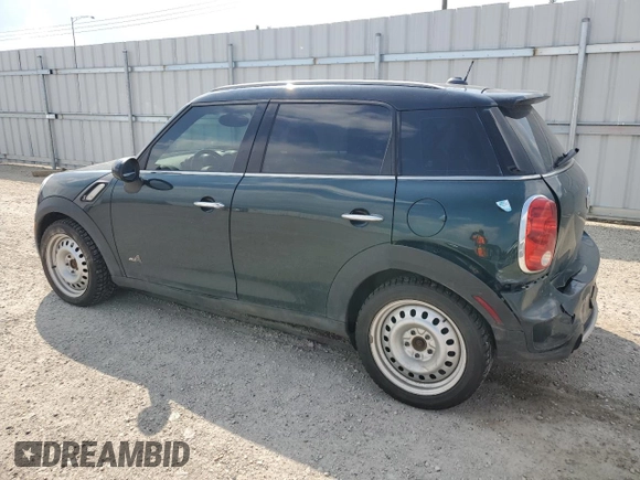 2012 MINI Countryman S with VIN WMWZC5C54CWL57554, listed as a Copart auction lot 59699865 with 144,737 mi miles and Salvage title. Bid and sale history available at DreamBid. Image 2.