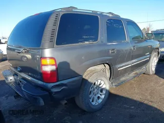 2001 Chevrolet Tahoe LT with VIN 1GNEC13T41J132352, listed as a IAAI auction lot 41490904 with Not provided miles and . Bid and sale history available at DreamBid. Image 4.