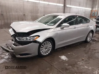 2016 Ford Fusion SE Hybrid z VIN 3FA6P0LU1GR304166, wystawiony jako IAAI lot #41932720 z przebiegiem 68 058 mil mil oraz . Historia ofert i sprzedaży dostępna na DreamBid. Obrazek 18.
