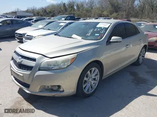 2013 Chevrolet Malibu LT with VIN 1G11E5SA4DF266366, listed as a IAAI auction lot 41806494 with 276,759 mi miles. Bid and sale history available at carsss.com. Image 2.