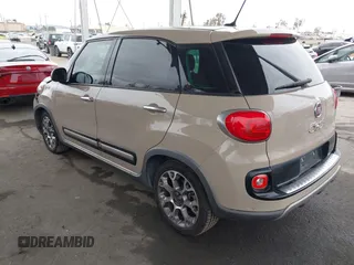 2014 FIAT 500L Trekking with VIN ZFBCFADHXEZ015287, listed as a IAAI auction lot 42063297 with 81,858 mi miles and . Bid and sale history available at DreamBid. Image 3.