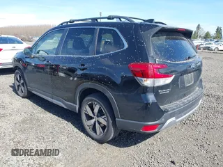 2021 Subaru Forester Touring with VIN JF2SKAXCXMH434072, listed as a IAAI auction lot 41857293 with 59,474 mi miles. Bid and sale history available at carsss.com. Image 3.