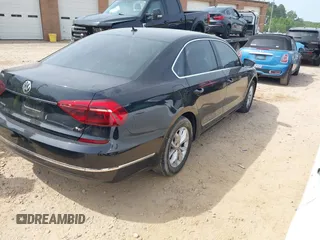2017 Volkswagen Passat S z VIN 1VWAT7A31HC046232, wystawiony jako IAAI lot #42168299 z przebiegiem 88 658 mil mil oraz . Historia ofert i sprzedaży dostępna na DreamBid. Obrazek 4.