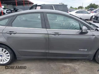 2015 Ford Fusion SE Hybrid with VIN 3FA6P0LU7FR254503, listed as a IAAI auction lot 42475860 with 169,980 mi miles and . Bid and sale history available at DreamBid. Image 14.