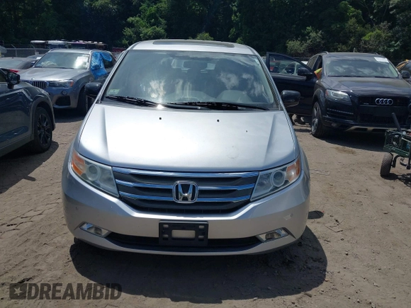 2012 Honda Odyssey Touring with VIN 5FNRL5H9XCB026741, listed as a IAAI auction lot 42808245 with 293,422 mi miles and . Bid and sale history available at DreamBid. Image 12.