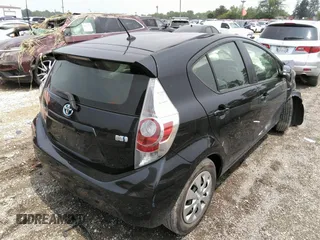 2014 Toyota Prius One with VIN JTDKDTB34E1069233, listed as a IAAI auction lot 36813619 with Not Provided miles and . Bid and sale history available at DreamBid. Image 4.