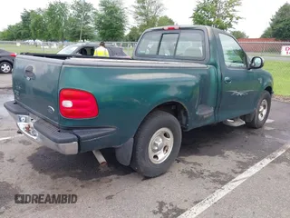 1999 Ford F-150 with VIN 2FTRF07W5XCB01716, listed as a IAAI auction lot 42681572 with 115,904 mi miles and . Bid and sale history available at DreamBid. Image 4.