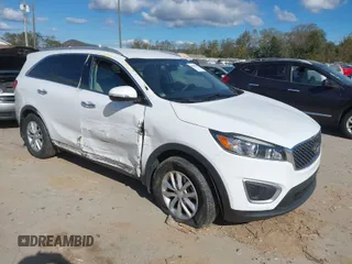 2018 Kia Sorento LX with VIN 5XYPGDA36JG389698, listed as a IAAI auction lot 40463225 with 120,088 mi miles. Bid and sale history available at carsss.com. Image 1.