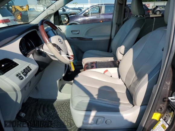 2013 Toyota Sienna XLE with VIN 5TDDK3DC5DS049425, listed as a Copart auction lot 62391555 with 108,594 mi miles and Salvage title. Bid and sale history available at DreamBid. Image 7.