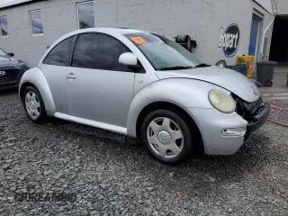 2000 Volkswagen Beetle GLX with VIN 3VWDD21C0YM482825, listed as a Copart auction lot 53031135 with 153,167 mi miles and Salvage Title. Bid and sale history available at DreamBid. Image 4.