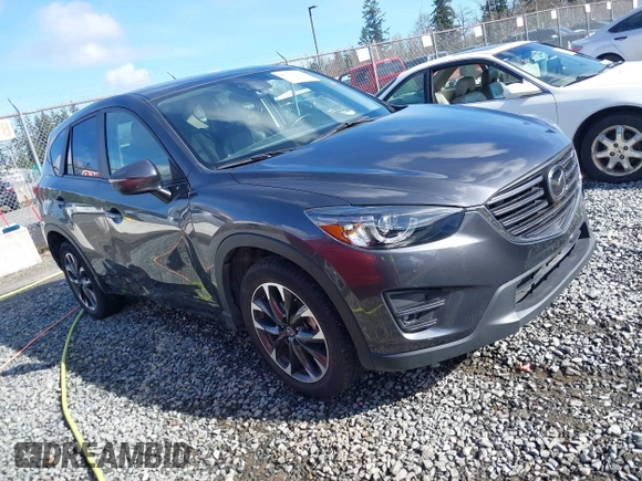 2016 Mazda CX-5 Grand Touring with VIN JM3KE4DY9G0895006, listed as a IAAI auction lot 41703146 with 39,359 mi miles. Bid and sale history available at carsss.com. Image 1.