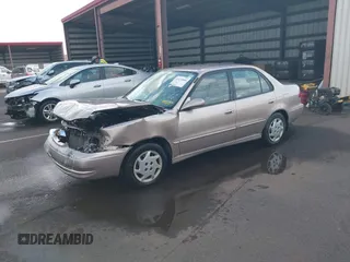 1999 Toyota Corolla VE with VIN 1NXBR12E4XZ182751, listed as a IAAI auction lot 41433066 with 56,904 mi miles and . Bid and sale history available at DreamBid. Image 17.