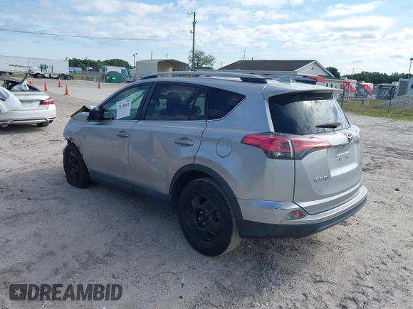 2017 Toyota RAV4 LE with VIN 2T3ZFREV2HW324895, listed as a IAAI auction lot 39150601 with 111,676 mi miles and . Bid and sale history available at carsss.com. Image 3.