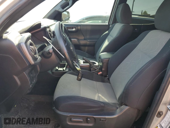 2023 Toyota Tacoma SR with VIN 3TMCZ5AN8PM545588, listed as a Copart auction lot 57528655 with 73,286 mi miles and Salvage title. Bid and sale history available at DreamBid. Image 7.