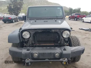 2014 Jeep Wrangler Unlimited Sport with VIN 1C4BJWDG7EL244749, listed as a IAAI auction lot 41871127 with 128,420 mi miles and . Bid and sale history available at DreamBid. Image 13.