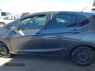 2018 Honda Fit LX with VIN 3HGGK5H51JM731851, listed as a IAAI auction lot 42570144 with 69,236 mi miles and . Bid and sale history available at DreamBid. Image 14.