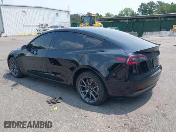2023 Tesla Model 3 z VIN 5YJ3E1EA4PF565899, wystawiony jako IAAI lot #42436473 z przebiegiem 30 141 mil mil oraz . Historia ofert i sprzedaży dostępna na DreamBid. Obrazek 3.