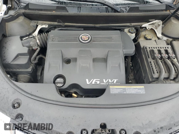 2013 Cadillac SRX Performance Collection with VIN 3GYFNHE33DS602428, listed as a Copart auction lot 55688555 with 143,504 mi miles and Salvage title. Bid and sale history available at DreamBid. Image 12.