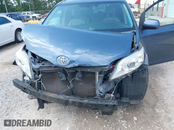 2015 Toyota Sienna LE AAS with VIN 5TDKK3DCXFS624984, listed as a IAAI auction lot 42560632 with 169,034 mi miles and . Bid and sale history available at DreamBid. Image 6.