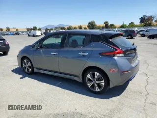 2018 Nissan LEAF SL with VIN 1N4AZ1CP7JC306403, listed as a Copart auction lot 65481895 with 98,724 mi miles and Clean title. Bid and sale history available at DreamBid. Image 2.