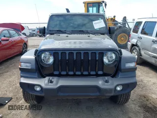 2023 Jeep Wrangler Sport S with VIN 1C4HJXDN6PW599895, listed as a IAAI auction lot 42242107 with 53,980 mi miles and . Bid and sale history available at DreamBid. Image 12.
