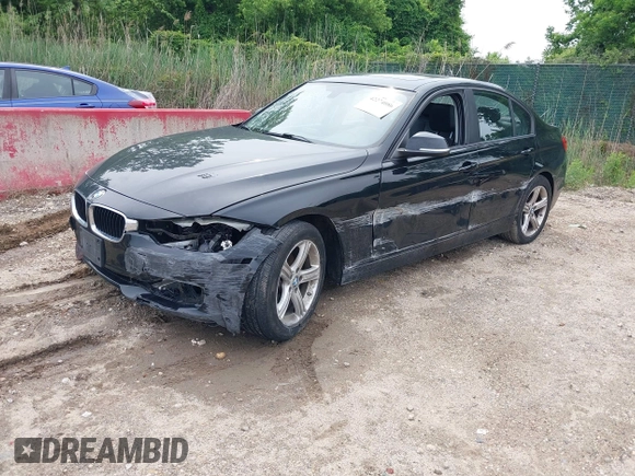 2014 BMW 3 Series 320i with VIN WBA3B1C52EK135610, listed as a IAAI auction lot 42274086 with 69,536 mi miles and . Bid and sale history available at DreamBid. Image 2.