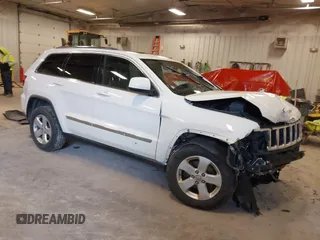 2011 Jeep Grand Cherokee 70th Anniversary with VIN 1J4RR4GG4BC702759, listed as a IAAI auction lot 41871604 with 143,583 mi miles. Bid and sale history available at carsss.com. Image 1.