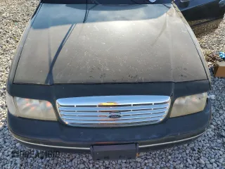 2002 Ford Crown Victoria Police with VIN 2FAFP71W52X157857, listed as a Copart auction lot 65963304 with 203,427 mi miles and Clean Title. Bid and sale history available at carsss.com. Image 11.