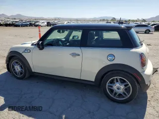 2009 MINI Hardtop S with VIN WMWMF73559TW83208, listed as a Copart auction lot 57347015 with 76,898 mi miles and Salvage title. Bid and sale history available at DreamBid. Image 2.
