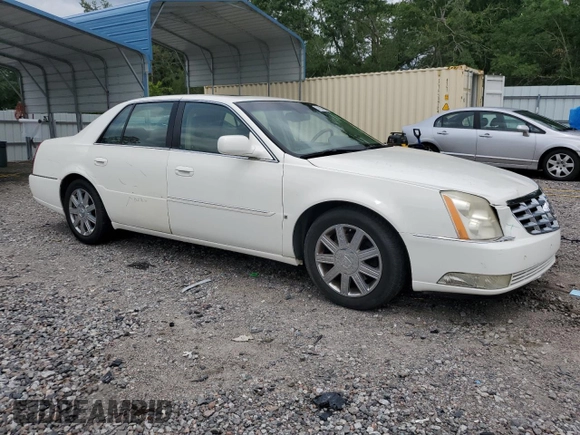 2006 Cadillac DTS 1SC z VIN 1G6KD57Y26U177384, wystawiony jako Copart lot #58200665 z przebiegiem 122 356 mil mil oraz Szkoda całkowita • Salvage title. Historia ofert i sprzedaży dostępna na DreamBid. Obrazek 4.