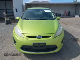 2011 Ford Fiesta SE with VIN 3FADP4EJ8BM157173, listed as a IAAI auction lot 41972892 with 407,227 mi miles. Bid and sale history available at carsss.com. Image 6.
