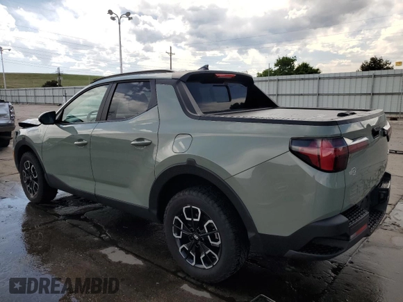 2022 Hyundai Santa Cruz SEL Premium z VIN 5NTJDDAF5NH016841, wystawiony jako Copart lot #58422695 z przebiegiem 27 287 mil mil oraz Szkoda całkowita • Salvage title. Historia ofert i sprzedaży dostępna na DreamBid. Obrazek 2.