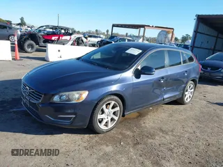 2015 Volvo V60 T5 Drive-E with VIN YV140MEJ8F1261268, listed as a IAAI auction lot 41517740 with 112,991 mi miles. Bid and sale history available at carsss.com. Image 17.
