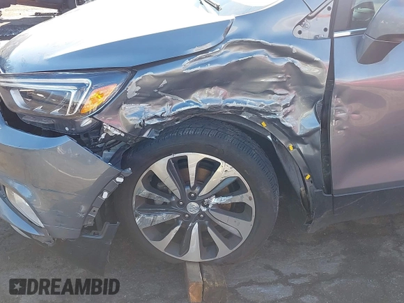 2019 Buick Encore Essence with VIN KL4CJGSM7KB927386, listed as a IAAI auction lot 40979134 with 77,784 mi miles. Bid and sale history available at carsss.com. Image 6.