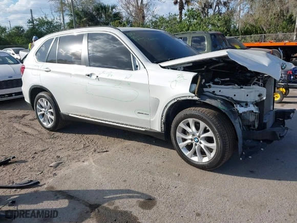 2016 BMW X5 xDrive35i with VIN 5UXKR0C54G0P27141, listed as a IAAI auction lot 41553602 with 61,947 mi miles. Bid and sale history available at carsss.com. Image 1.