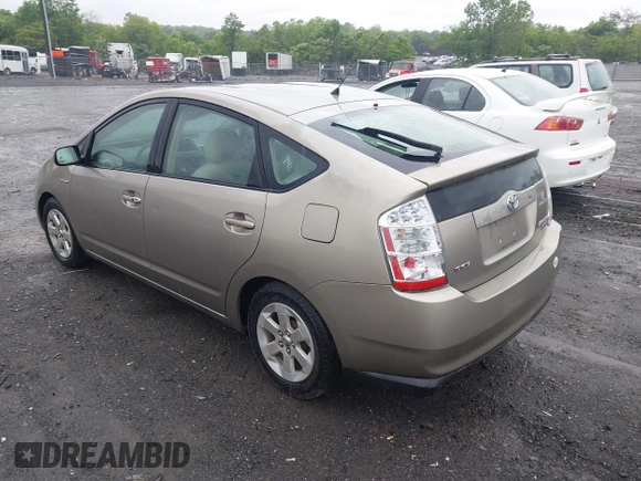2006 Toyota Prius z VIN JTDKB20U067517414, wystawiony jako IAAI lot #42251158 z przebiegiem 233 266 mil mil oraz . Historia ofert i sprzedaży dostępna na DreamBid. Obrazek 3.