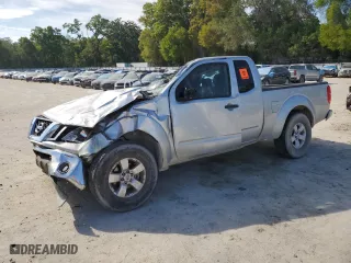 2009 Nissan Frontier SE with VIN 1N6AD06U09C428159, listed as a Copart auction lot 50937955 with 117,916 mi miles and Salvage Title. Bid and sale history available at carsss.com. Image 1.