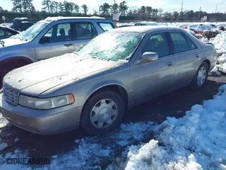 2001 Cadillac Seville Luxury SLS w/Monochrome Pkg with VIN 1G6KS54YX1U103892, listed as a IAAI auction lot 41550499 with 999,999 mi miles. Bid and sale history available at carsss.com. Image 2.