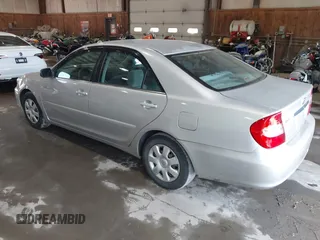 2004 Toyota Camry LE with VIN 4T1BE32K64U327071, listed as a IAAI auction lot 42438458 with 194,614 mi miles and . Bid and sale history available at DreamBid. Image 3.