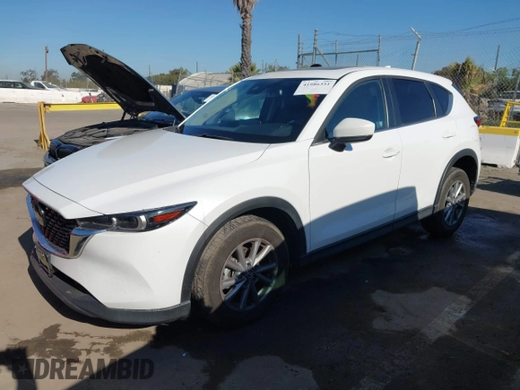 2022 Mazda CX-5 S Preferred with VIN JM3KFBCM2N0630148, listed as a IAAI auction lot 41986351 with 45,664 mi miles and . Bid and sale history available at carsss.com. Image 2.