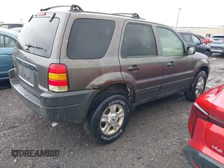 2003 Ford Escape XLT Popular 2 with VIN 1FMYU93133KD90533, listed as a IAAI auction lot 42361131 with 172,326 mi miles and . Bid and sale history available at DreamBid. Image 4.