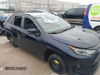 2021 Toyota RAV4 Hybrid XSE with VIN 2T3E6RFV5MW002856, listed as a IAAI auction lot 42387921 with Not provided miles and . Bid and sale history available at DreamBid. Image 6.