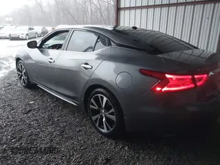 2016 Nissan Maxima SL with VIN 1N4AA6AP2GC379971, listed as a IAAI auction lot 41712080 with 192,382 mi miles and . Bid and sale history available at DreamBid. Image 3.