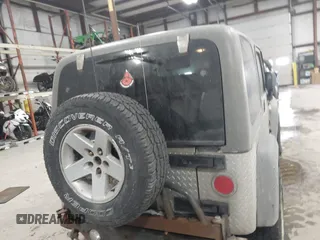 2005 Jeep Wrangler Rubicon with VIN 1J4FA69S65P311732, listed as a IAAI auction lot 41442147 with 174,277 mi miles. Bid and sale history available at carsss.com. Image 16.