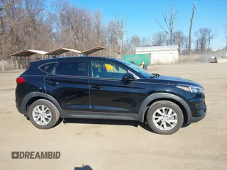 2019 Hyundai Tucson SE with VIN KM8J2CA46KU073107, listed as a IAAI auction lot 41648453 with 58,417 mi miles. Bid and sale history available at carsss.com. Image 13.