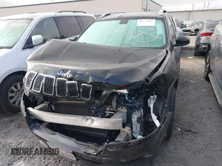 2019 Jeep Cherokee Latitude z VIN 1C4PJLCB2KD455843, wystawiony jako IAAI lot #42779247 z przebiegiem 65 576 mil mil oraz . Historia ofert i sprzedaży dostępna na DreamBid. Obrazek 13.