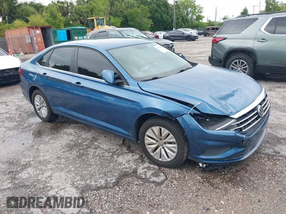 2019 Volkswagen Jetta S z VIN 3VWC57BU4KM005853, wystawiony jako IAAI lot #42183004 z przebiegiem 104 691 mil mil oraz . Historia ofert i sprzedaży dostępna na DreamBid. Obrazek 1.
