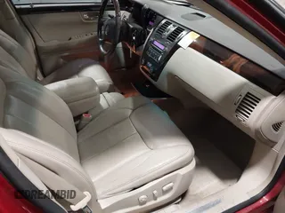 2009 Cadillac DTS w/1SA with VIN 1G6KD57Y59U149387, listed as a IAAI auction lot 41957750 with 94,939 mi miles. Bid and sale history available at carsss.com. Image 5.